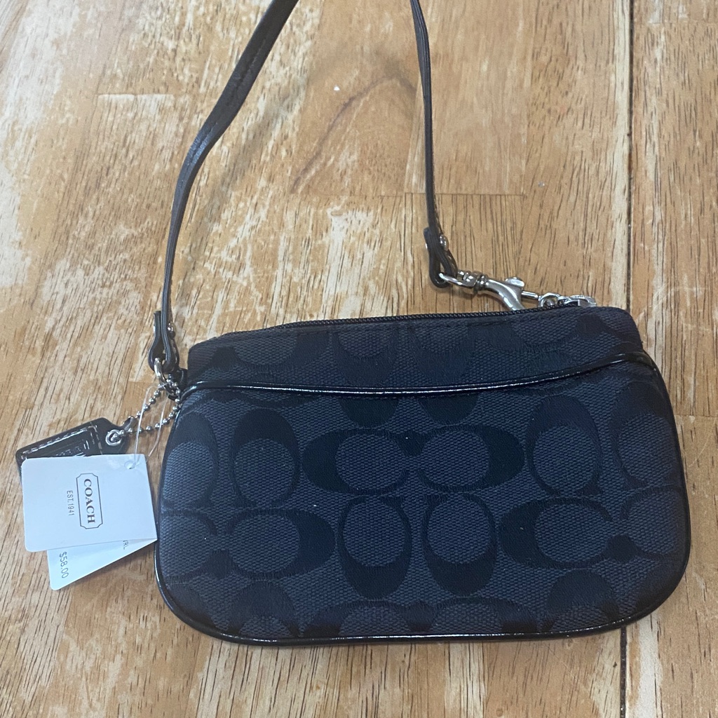 Coach Dark Patterned Wristlet